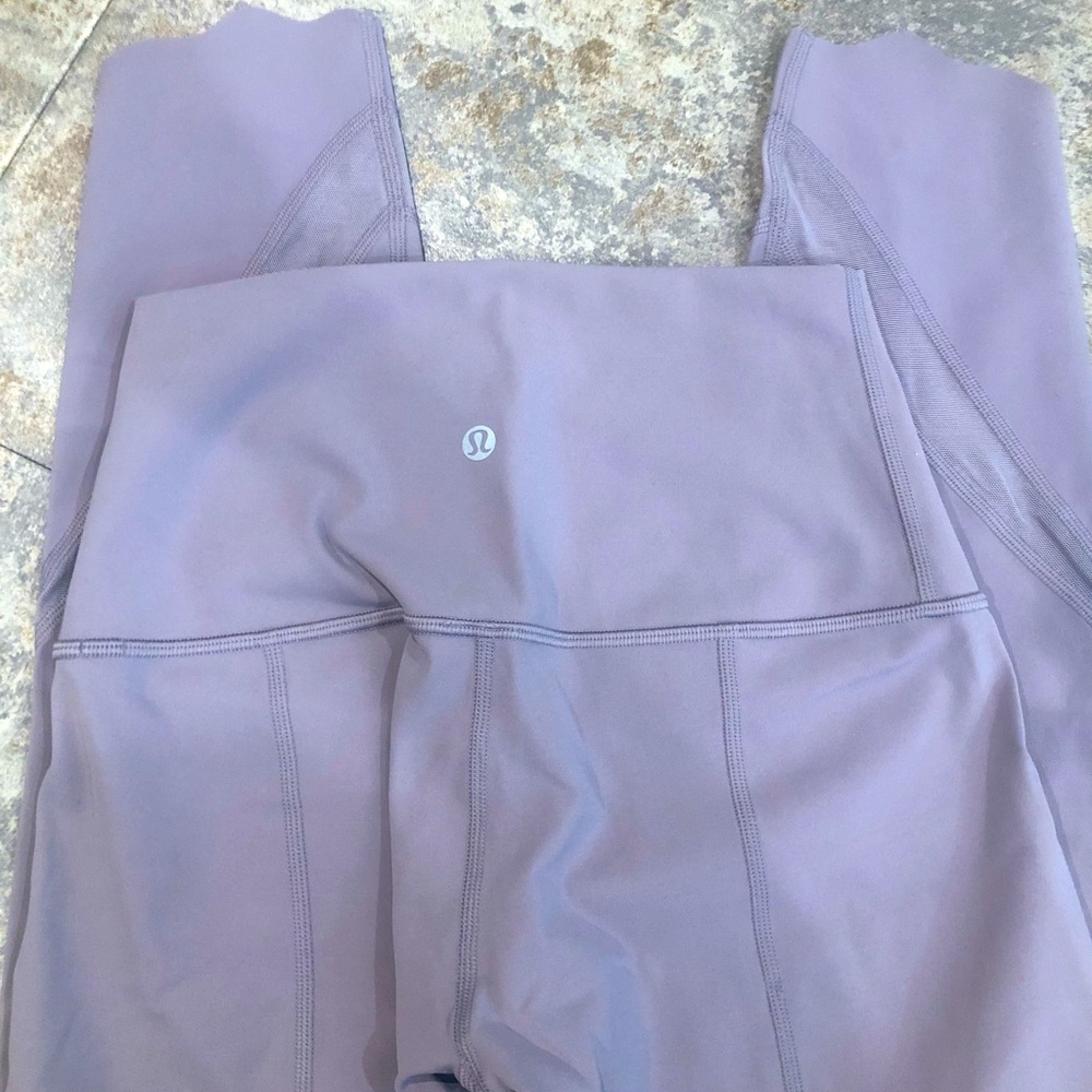 Lulu size 4 leggings. Lavender color. Like new.